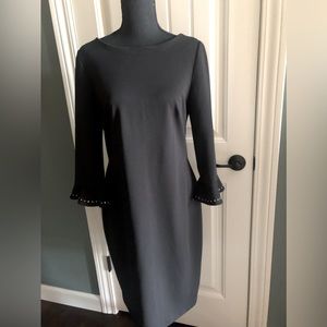 Calvin Klein Size 10 Knit Dress. Silver accent Flounce Sleeves.